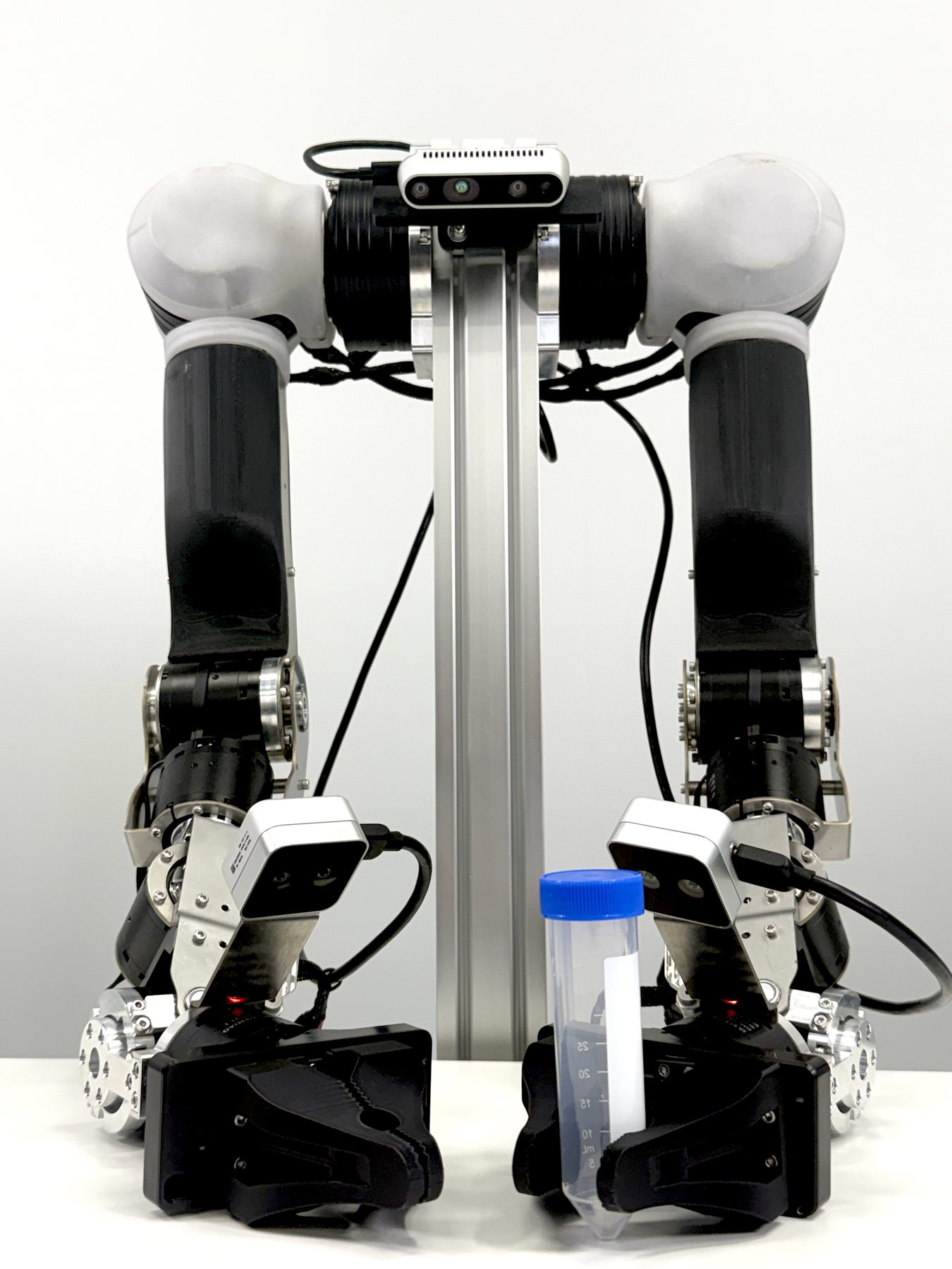 Yuri Desktop — bimanual OpenArm+ arms on an integrated desktop stand